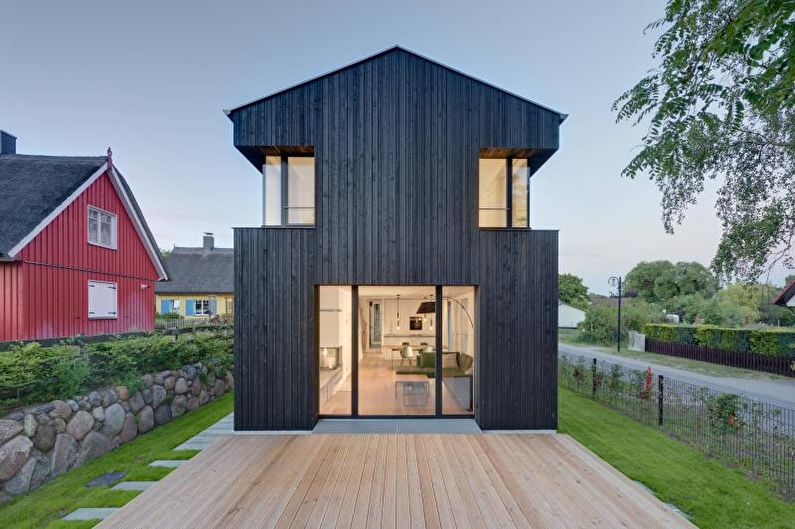 Черный загородный дом в скандинавском стиле - фото