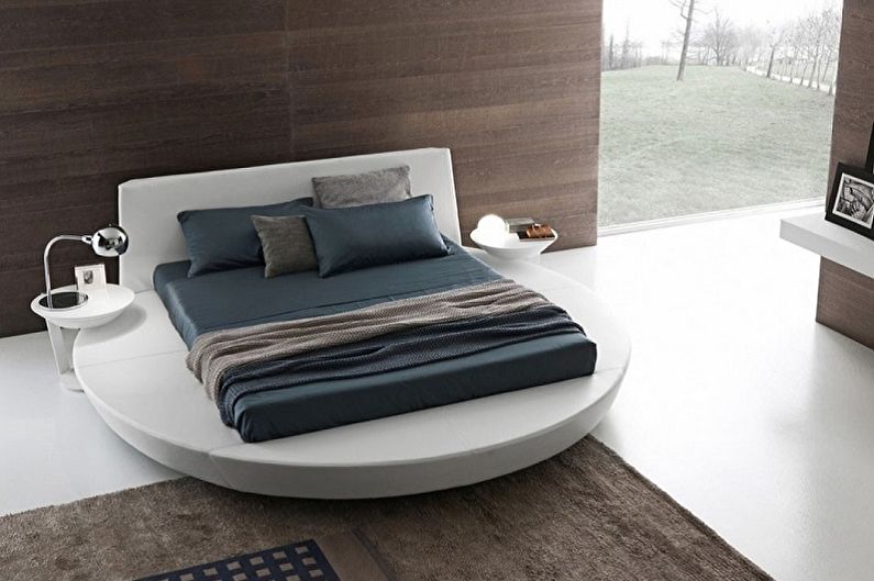 Виды круглых кроватей в спальню - Прямоугольная кровать на круглом подиуме
