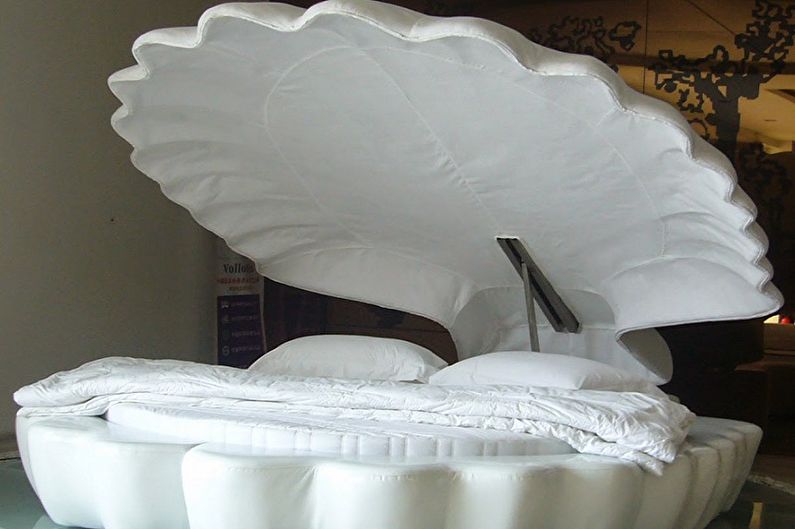 Виды круглых кроватей в спальню - Круглая кровать-раковина