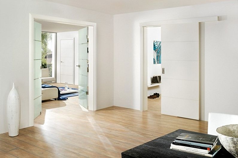 Белые двери в разных стилях интерьера - Лаконичный минимализм